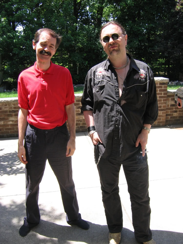Brian and John pose on the patio